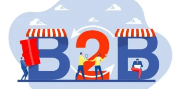 "Illustration representing the concept of B2B (Business to Business), featuring large 3D letters 'B2B' with small business-like awnings on the 'B' letters. Several people are interacting with the letters, engaging in various business-related activities, symbolizing collaboration and trade."